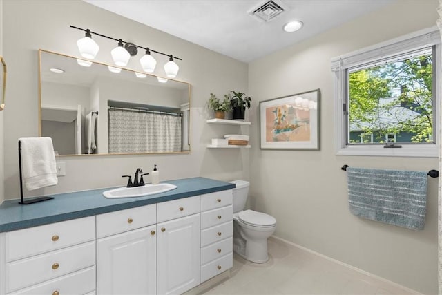 22 Dunedin St, Cranston, RI 02920 - bathroom with vanity, toilet, and baseboards