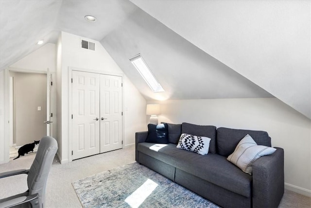 22 Dunedin St, Cranston, RI 02920 - living area with carpet floors, vaulted ceiling, baseboards, a skylight, and recessed lighting