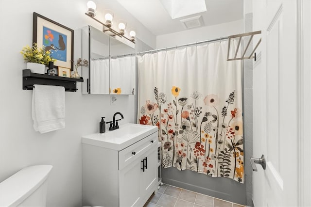 22 Dunedin St, Cranston, RI 02920 - bathroom featuring vanity, toilet, tile patterned floors, and shower / bathtub combination with curtain