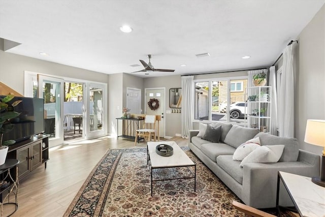 22 Dunedin St, Cranston, RI 02920 - living area with light wood finished floors, ceiling fan, and recessed lighting