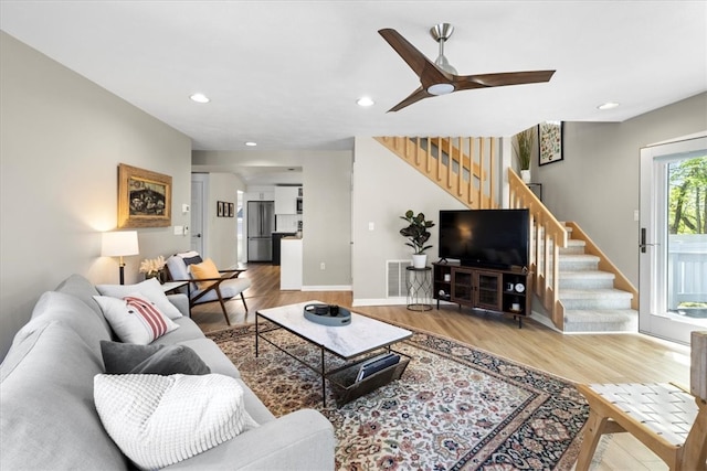 22 Dunedin St, Cranston, RI 02920 - living room featuring stairs, wood finished floors, ceiling fan, recessed lighting, and baseboards