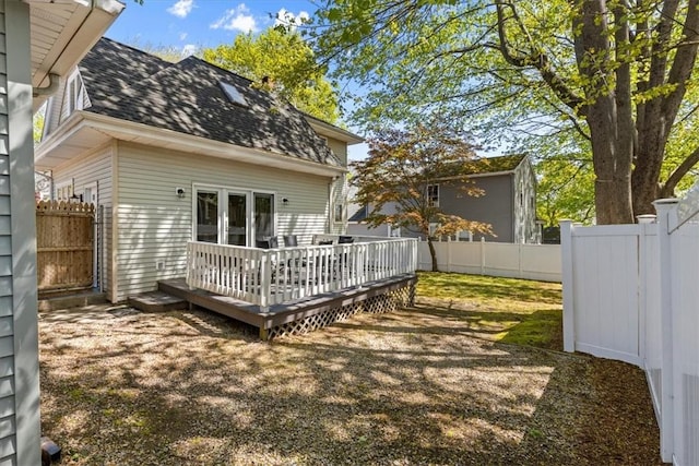 22 Dunedin St, Cranston, RI 02920 - fenced backyard with a deck