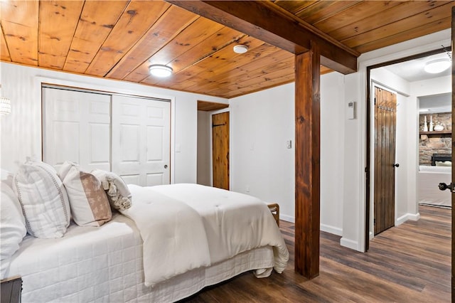 310 Old Coach Rd, Charlestown, RI 02813 - bedroom with wood ceiling, dark wood-style flooring, baseboards, and a closet