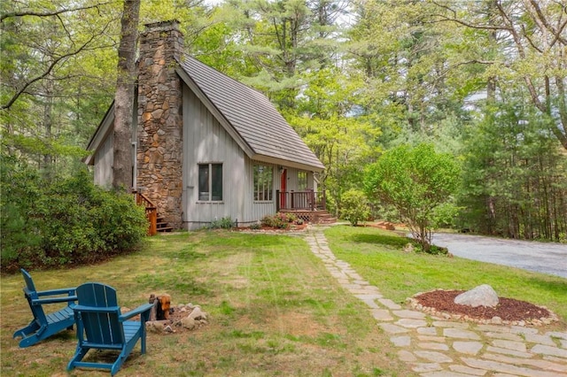 310 Old Coach Rd, Charlestown, RI 02813 - view of side of property featuring a yard and a chimney