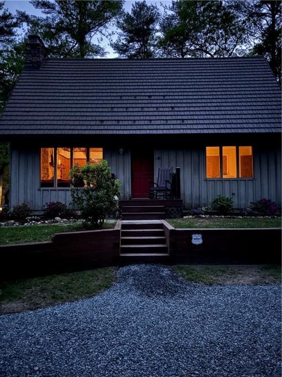 310 Old Coach Rd, Charlestown, RI 02813 - view of front of home featuring board and batten siding and a chimney