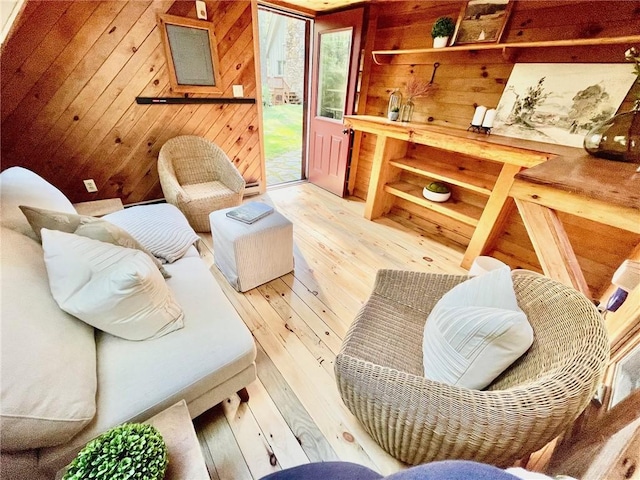 310 Old Coach Rd, Charlestown, RI 02813 - living room featuring wood walls and light wood finished floors