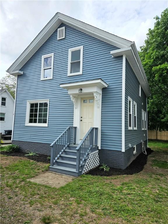 29 Arthur St, Warwick, RI 02888 - view of front of property with a front lawn