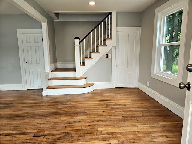 29 Arthur St, Warwick, RI 02888 - stairway featuring wood finished floors, baseboards, and recessed lighting