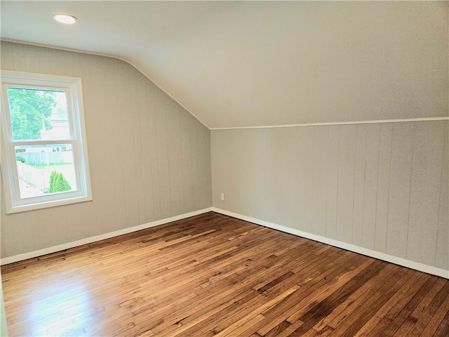 29 Arthur St, Warwick, RI 02888 - bonus room with wood-type flooring, vaulted ceiling, and wooden walls
