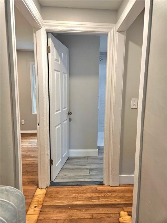 29 Arthur St, Warwick, RI 02888 - corridor featuring wood finished floors and baseboards