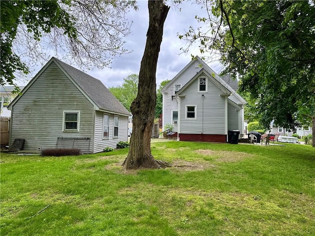 3 Jefferson St, Warwick, RI 02888 - view of side of property featuring a yard