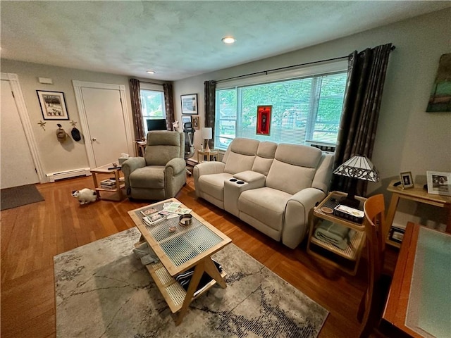 3 Jefferson St, Warwick, RI 02888 - living room with baseboard heating, wood finished floors, and recessed lighting