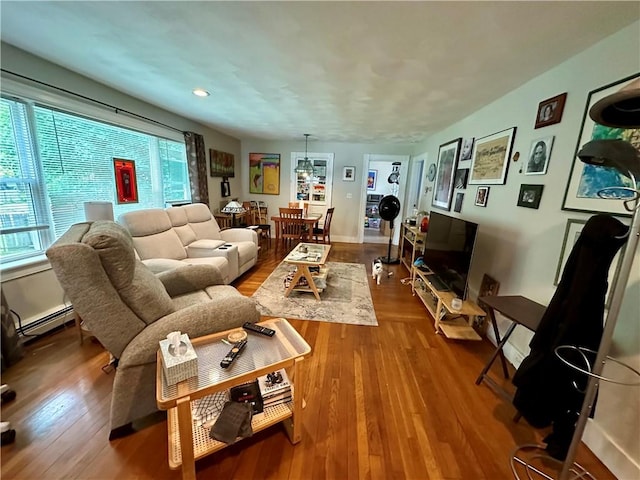 3 Jefferson St, Warwick, RI 02888 - living area featuring a baseboard radiator, wood finished floors, and recessed lighting