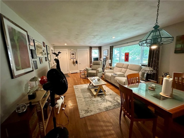 3 Jefferson St, Warwick, RI 02888 - living area featuring wood-type flooring, recessed lighting, and a baseboard heating unit