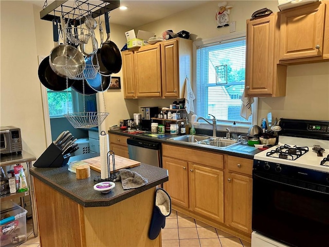 3 Jefferson St, Warwick, RI 02888 - kitchen with range with gas stovetop, dishwasher, a sink, dark countertops, and light tile patterned flooring
