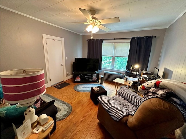 3 Jefferson St, Warwick, RI 02888 - living area with radiator, a ceiling fan, wood finished floors, and crown molding