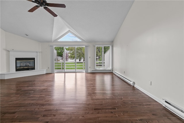 446 Paddock Ln, Bristol, RI 02809 - unfurnished living room featuring a baseboard heating unit, vaulted ceiling, a ceiling fan, wood finished floors, and a glass covered fireplace