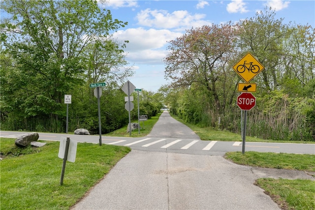 446 Paddock Ln, Bristol, RI 02809 - view of asphalt street with traffic signs