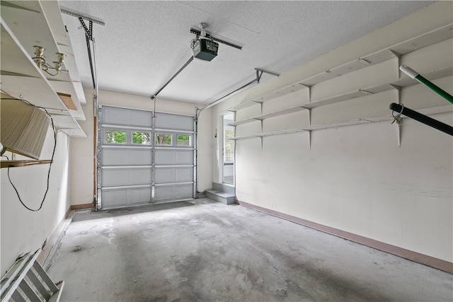 446 Paddock Ln, Bristol, RI 02809 - garage with a garage door opener and baseboards