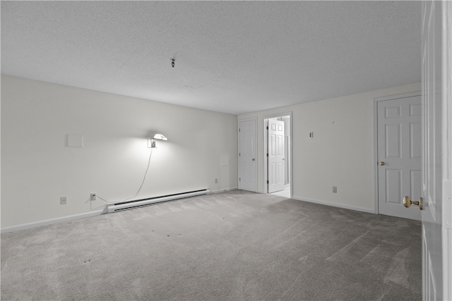446 Paddock Ln, Bristol, RI 02809 - unfurnished room featuring a baseboard heating unit, carpet, a textured ceiling, and baseboards