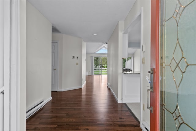 446 Paddock Ln, Bristol, RI 02809 - entrance foyer with a baseboard radiator, wood finished floors, and baseboards