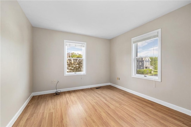40 Atlantic St, Newport, RI 02840 - unfurnished room with baseboards and light wood-type flooring