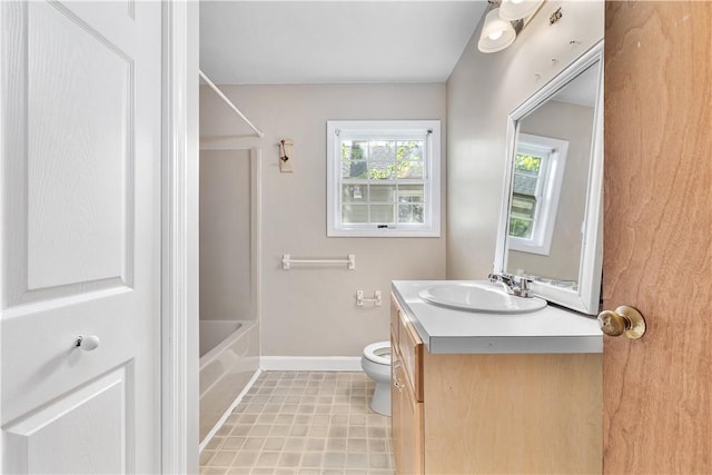 40 Atlantic St, Newport, RI 02840 - bathroom with vanity, toilet, baseboards, and bathtub / shower combination