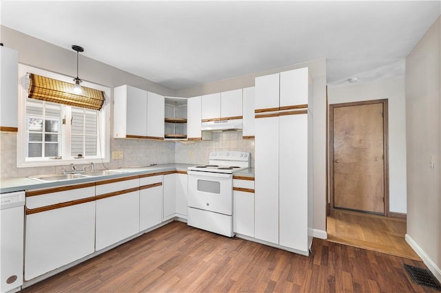 40 Atlantic St, Newport, RI 02840 - kitchen featuring white appliances, a sink, under cabinet range hood, and decorative backsplash