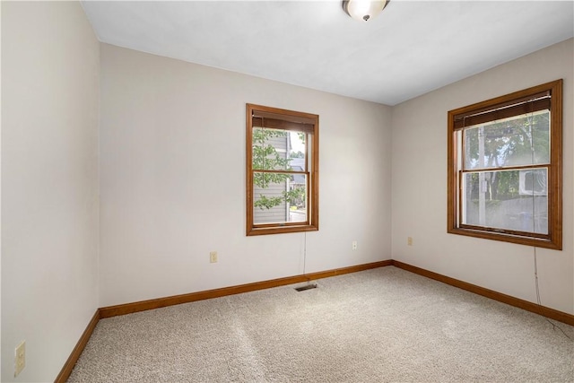 40 Atlantic St, Newport, RI 02840 - empty room featuring carpet floors and baseboards