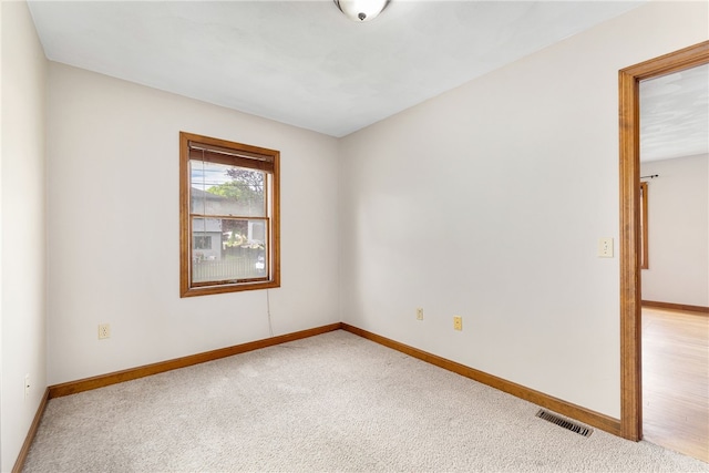 40 Atlantic St, Newport, RI 02840 - spare room featuring baseboards and light colored carpet