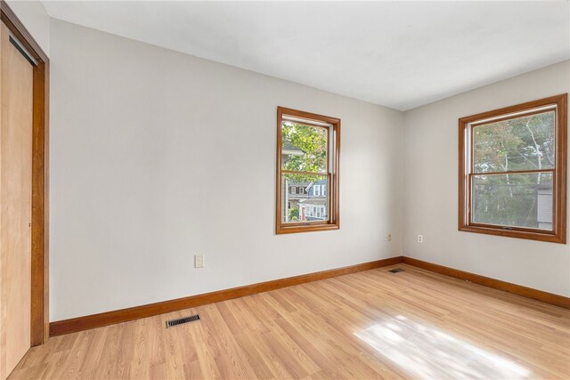 40 Atlantic St, Newport, RI 02840 - empty room with light wood-style flooring and baseboards