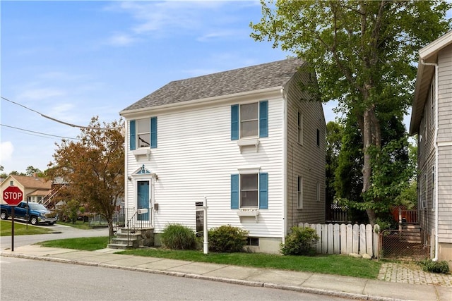 40 Atlantic St, Newport, RI 02840 - view of front of house with a shingled roof
