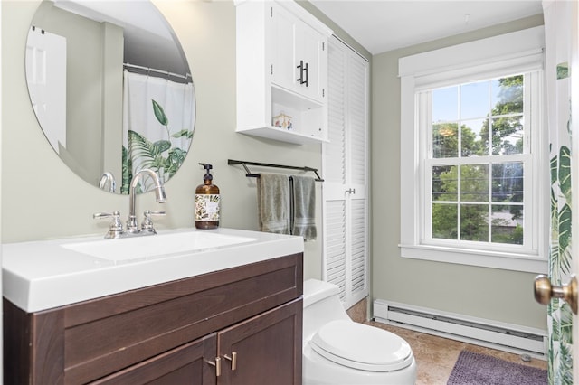 405 Eaton St, Providence, RI 02908 - full bath with a baseboard radiator, vanity, toilet, and healthy amount of natural light
