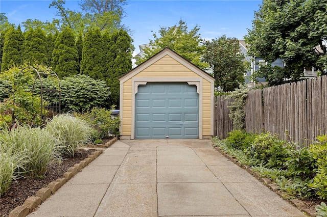 405 Eaton St, Providence, RI 02908 - detached garage featuring concrete driveway