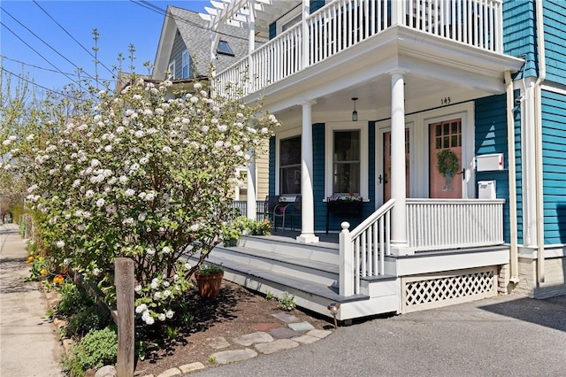 143 Ivy St, Providence, RI 02906 - entrance to property featuring a balcony and covered porch