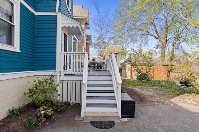 143 Ivy St, Providence, RI 02906 - entrance to property featuring a wooden deck
