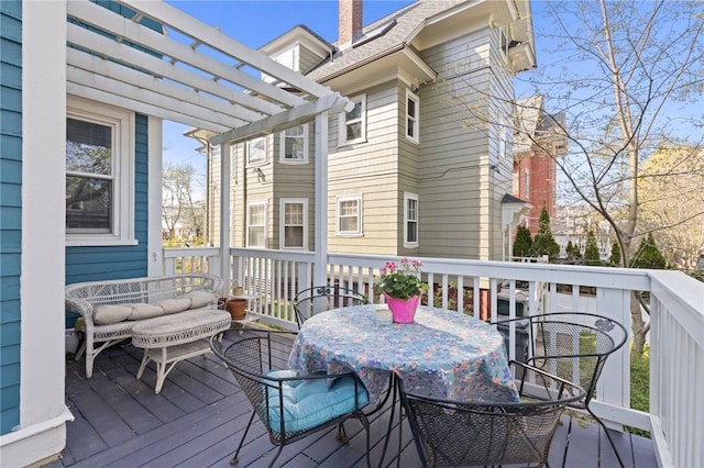 143 Ivy St, Providence, RI 02906 - deck with outdoor dining space and a pergola