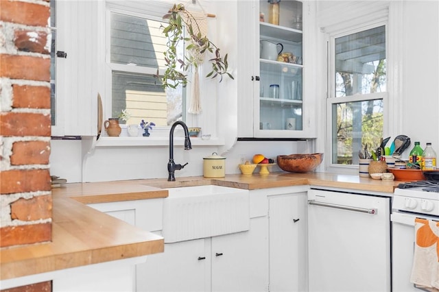 143 Ivy St, Providence, RI 02906 - kitchen with a sink, white appliances, and white cabinets