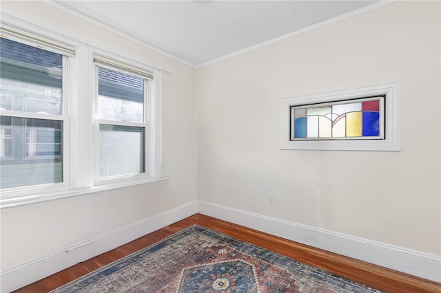 143 Ivy St, Providence, RI 02906 - unfurnished room with wood finished floors, baseboards, and ornamental molding