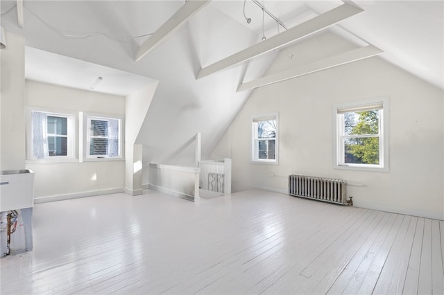 143 Ivy St, Providence, RI 02906 - additional living space featuring radiator and hardwood / wood-style floors
