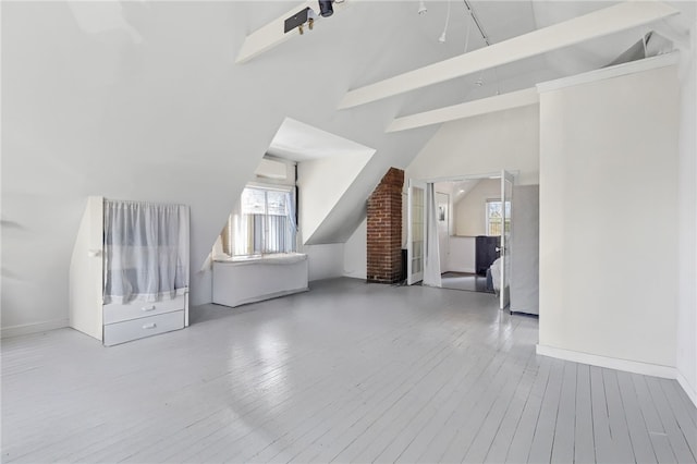 143 Ivy St, Providence, RI 02906 - bonus room with healthy amount of natural light, wood-type flooring, and baseboards