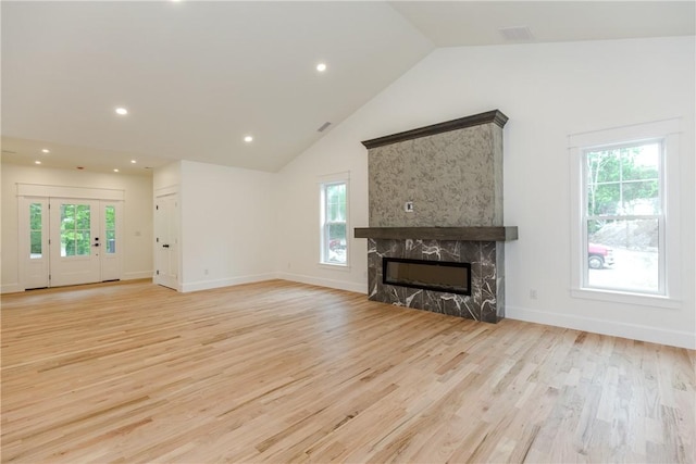 68 Orchard Ave, Johnston, RI 02919 - unfurnished living room with light wood finished floors, a high end fireplace, recessed lighting, baseboards, and high vaulted ceiling