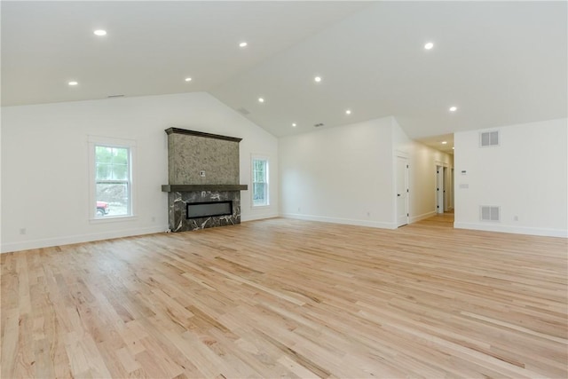68 Orchard Ave, Johnston, RI 02919 - unfurnished living room featuring plenty of natural light, light wood-type flooring, high vaulted ceiling, recessed lighting, and baseboards