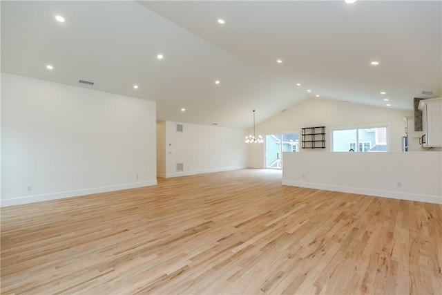 68 Orchard Ave, Johnston, RI 02919 - unfurnished living room with a chandelier, light wood-style floors, lofted ceiling, baseboards, and recessed lighting