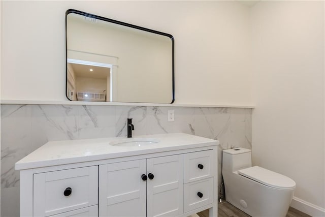 68 Orchard Ave, Johnston, RI 02919 - bathroom with vanity, toilet, and tile walls