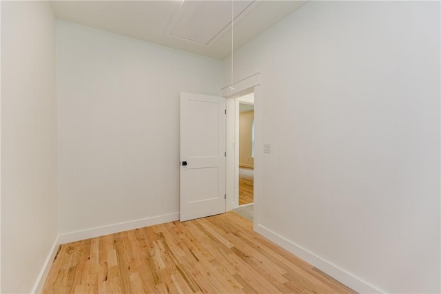 68 Orchard Ave, Johnston, RI 02919 - spare room with light wood finished floors, baseboards, and attic access
