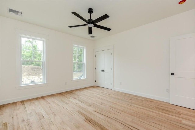 68 Orchard Ave, Johnston, RI 02919 - spare room with light wood finished floors, ceiling fan, and baseboards
