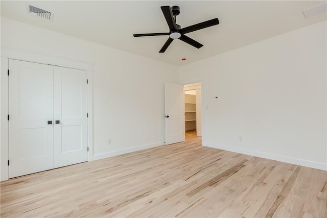 68 Orchard Ave, Johnston, RI 02919 - unfurnished bedroom with light wood-style flooring, a closet, baseboards, and a ceiling fan