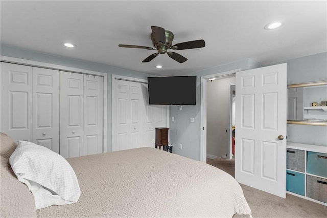 95 George Arden Ave, Warwick, RI 02886 - bedroom with two closets, recessed lighting, light colored carpet, and ceiling fan