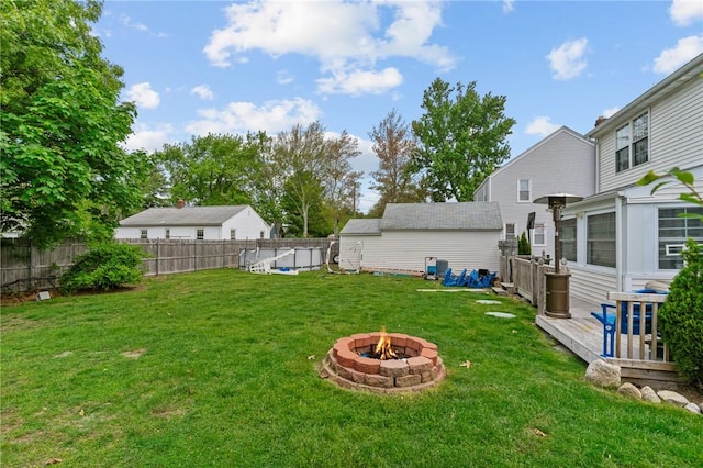 95 George Arden Ave, Warwick, RI 02886 - view of yard featuring a fire pit and a wooden deck